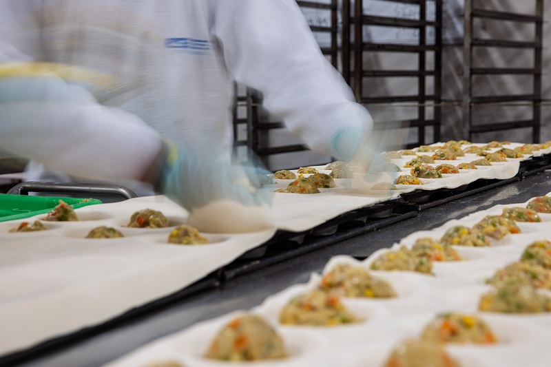 In a bakery preparing pies