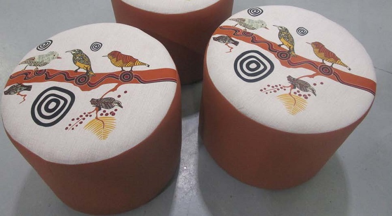 Three round ottomans with Aboriginal design print