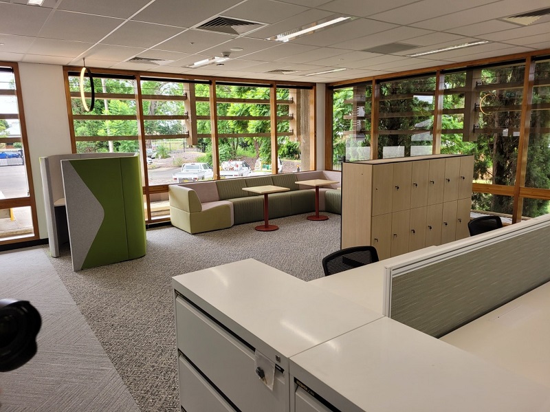 Open plan office work environment with internal office fitout with furniture
