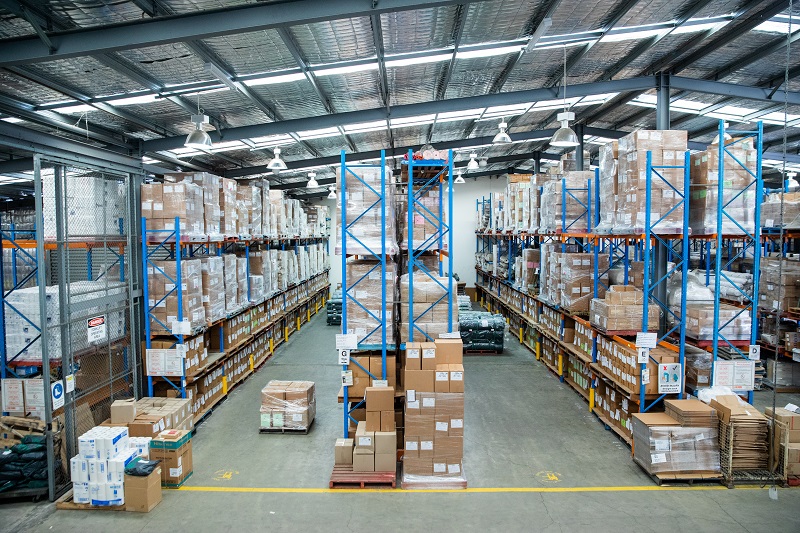 Large warehouse with boxes stacked on shelves