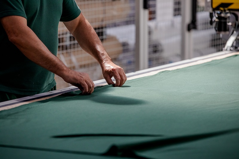 Person preparing material to be laser cut