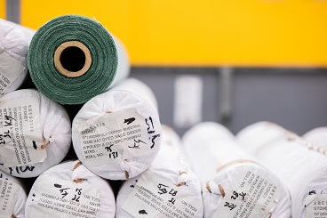 Rolls of green linen