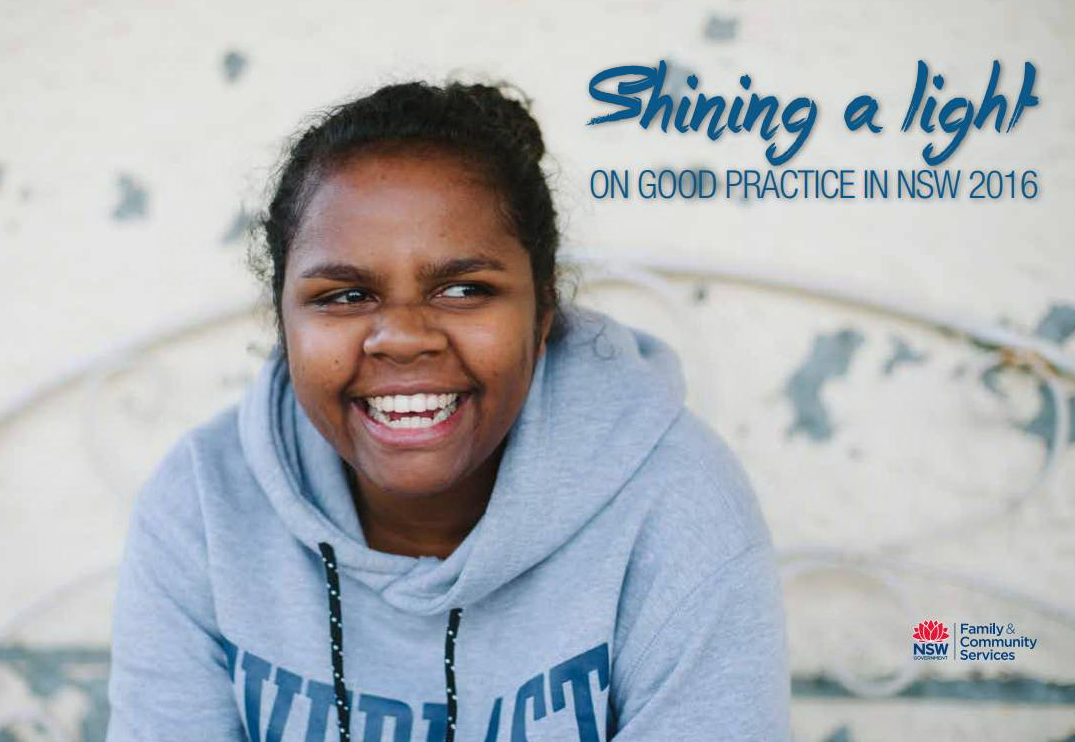 A young girl smiling happily laughing. 